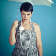 get over your divorce sad women holding umbrella