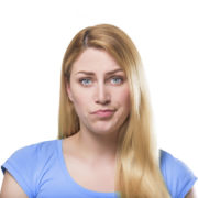 single parenting: blonde woman in blue top pouting