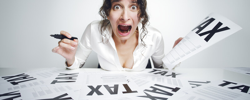 crazy woman with tax paperwork