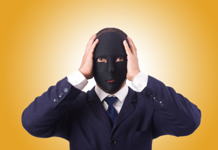 Man with black mask on his face